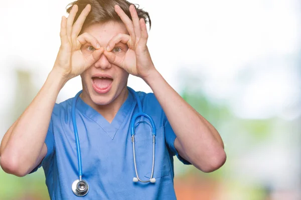 Young Doctor Wearing Medical Uniform Isolated Background Doing Gesture Binoculars — Stock Photo, Image