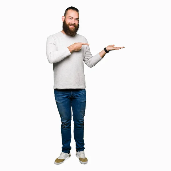 Young Blond Man Wearing Casual Sweater Amazed Smiling Camera While — Stock Photo, Image