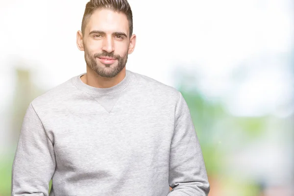 Junger Gutaussehender Mann Der Sweatshirt Über Isolierten Hintergrundhänden Trägt Und — Stockfoto