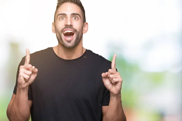 Joven Hombre Guapo Sobre Fondo Aislado Asombrado Sorprendido Mirando Hacia —  Fotos de Stock