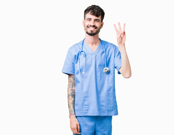 Joven Enfermero Guapo Vistiendo Uniforme Cirujano Sobre Fondo Aislado Mostrando —  Fotos de Stock