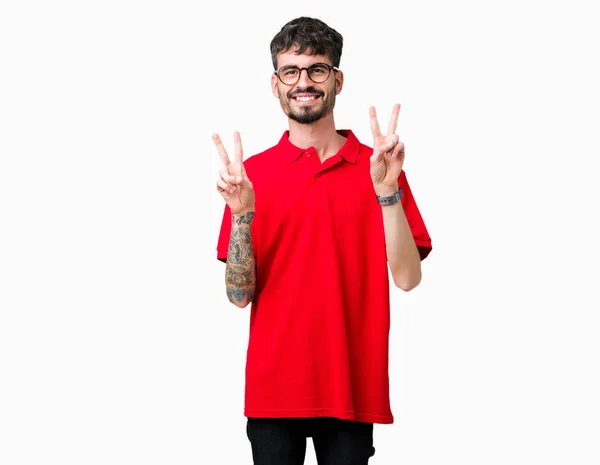 Homem Bonito Jovem Usando Óculos Sobre Fundo Isolado Sorrindo Olhando — Fotografia de Stock