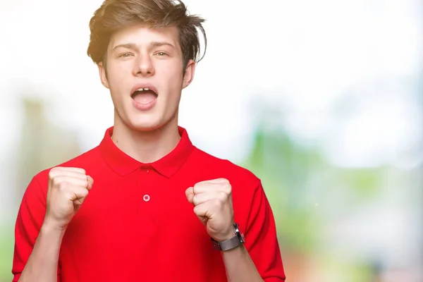 Jeune Bel Homme Portant Shirt Rouge Sur Fond Isolé Célébrant — Photo