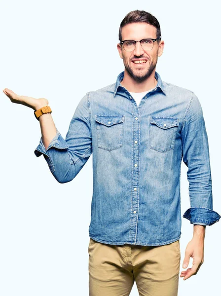 Handsome Man Wearing Glasses Smiling Cheerful Presenting Pointing Palm Hand — Stock Photo, Image