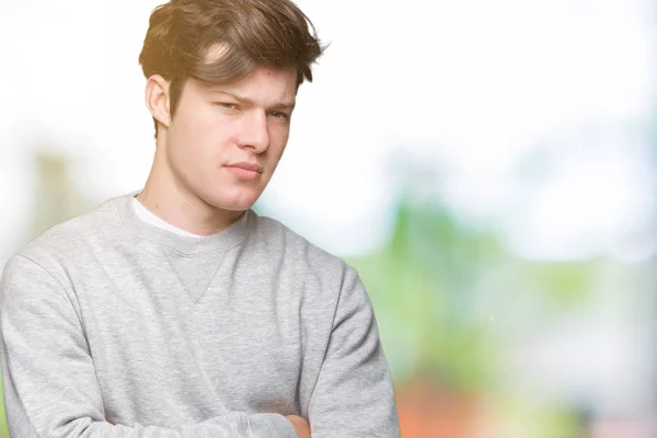 Joven Hombre Deportivo Guapo Con Sudadera Sobre Fondo Aislado Escéptico —  Fotos de Stock