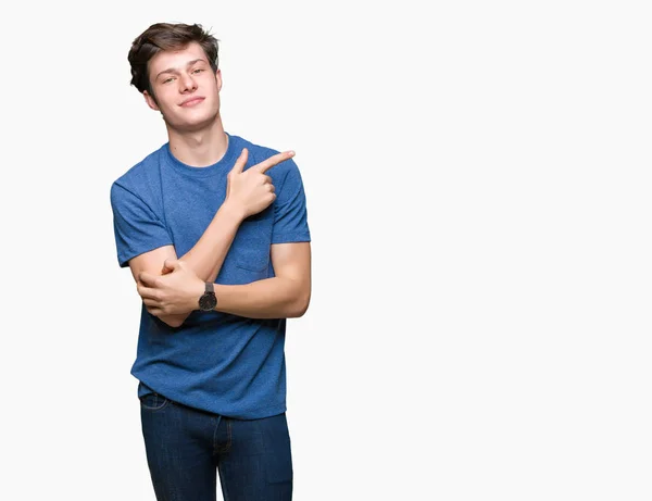 Joven Hombre Guapo Con Camiseta Azul Sobre Fondo Aislado Señalando —  Fotos de Stock