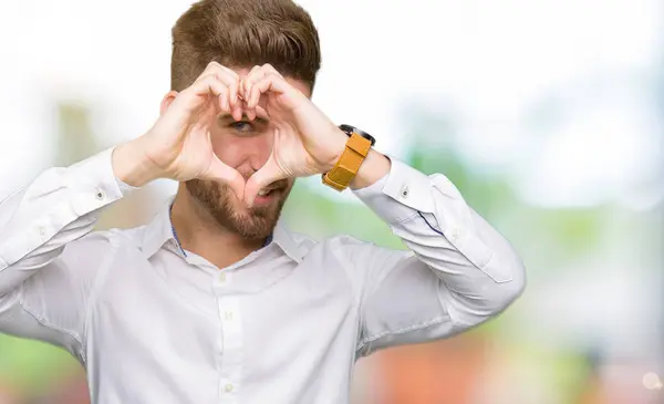 Joven Hombre Negocios Guapo Haciendo Forma Corazón Con Mano Los —  Fotos de Stock