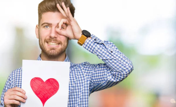 Young Handsome Man Holding Paper Red Heart Happy Face Smiling — Stock Photo, Image