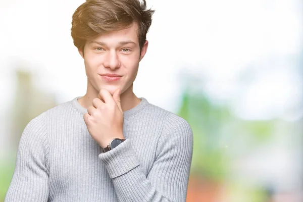 Joven Hombre Guapo Con Suéter Invierno Sobre Fondo Aislado Mirando —  Fotos de Stock