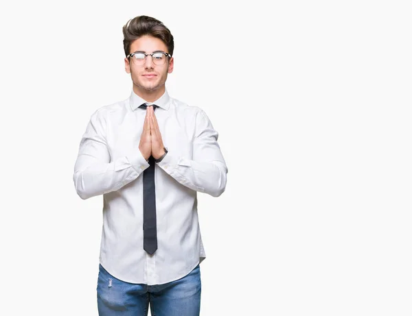 Jovem Homem Negócios Usando Óculos Sobre Fundo Isolado Orando Com — Fotografia de Stock