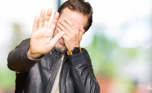 Middle Age Handsome Man Wearing Black Leather Jacket Covering Eyes — Stock Photo, Image
