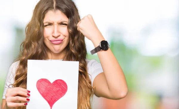 Young Adult Woman Holding Card Red Heart Annoyed Frustrated Shouting — Stock Photo, Image