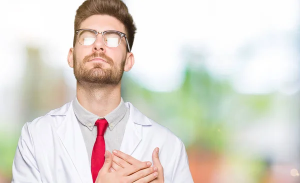 Young Handsome Scientist Man Wearing Glasses Smiling Hands Chest Closed — Stock Photo, Image