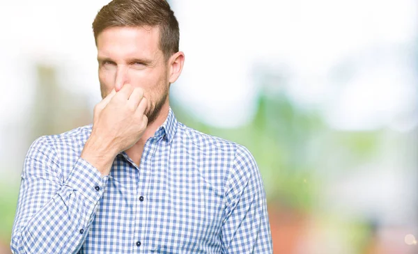 Handsome Business Man Blue Eyes Smelling Something Stinky Disgusting Intolerable — Stock Photo, Image