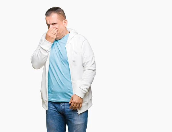 Middle Age Arab Man Wearing Sweatshirt Isolated Background Smelling Something — Stock Photo, Image