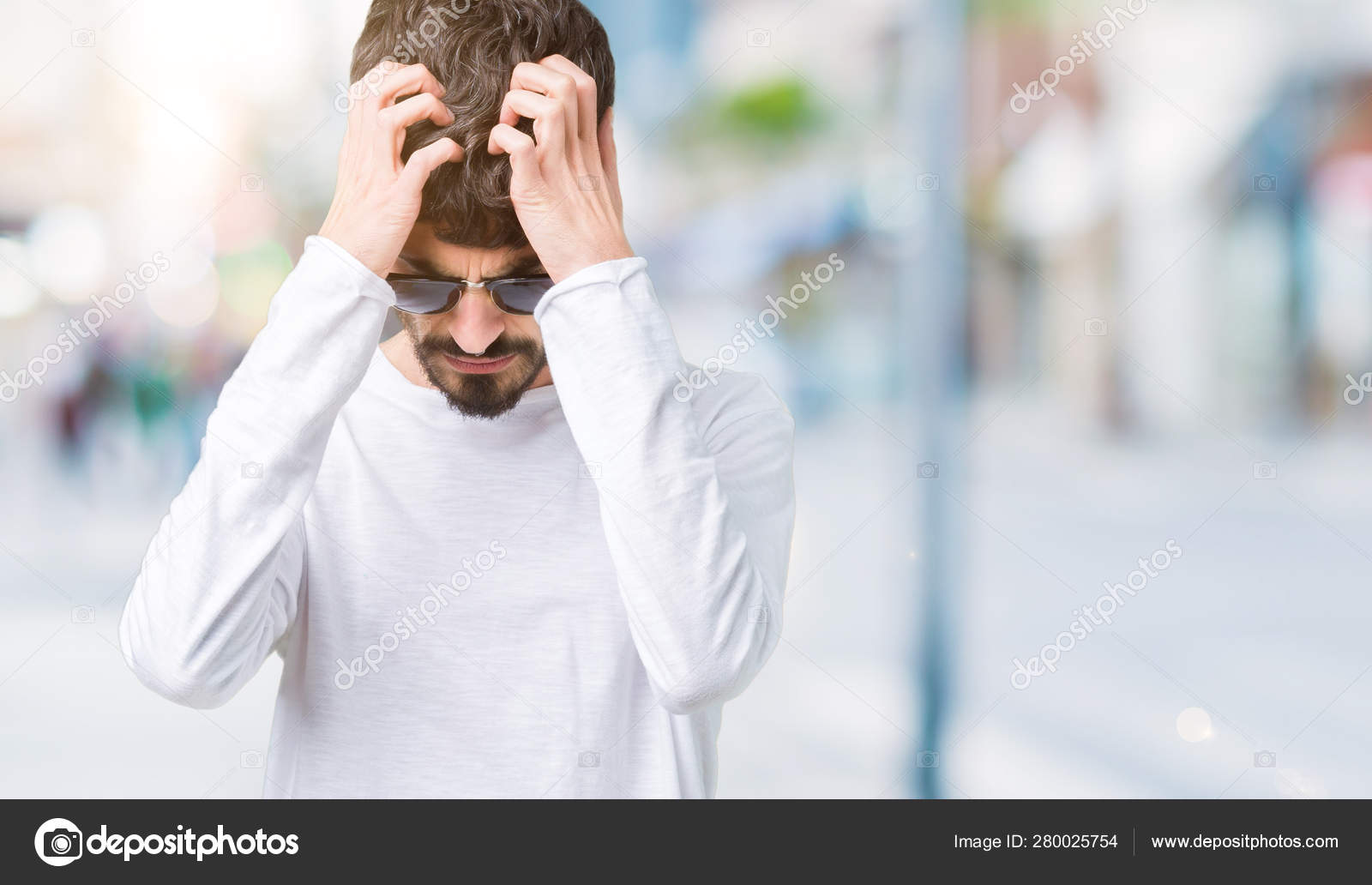 Young Handsome Man Wearing Sunglasses Isolated Background Suffering