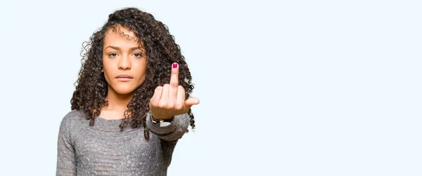 Young Beautiful Woman Curly Hair Wearing Grey Sweater Showing Middle — Stockfoto