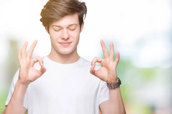 Joven Hombre Guapo Vistiendo Casual Camiseta Blanca Sobre Fondo Aislado —  Fotos de Stock