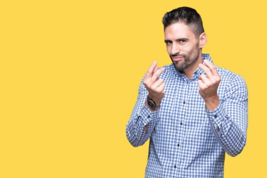 Maaş ödeme için milyoner iş soran izole arka plan yapıyor para hareketi el ile genç yakışıklı adam