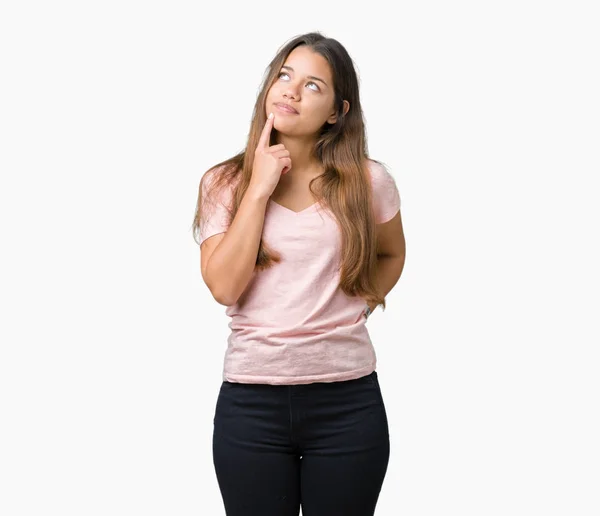 Joven Mujer Morena Hermosa Con Camiseta Rosa Sobre Fondo Aislado —  Fotos de Stock