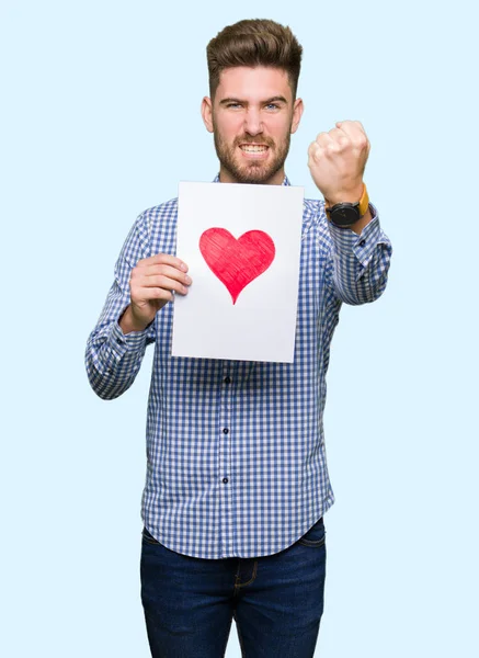 Young Handsome Man Holding Paper Red Heart Annoyed Frustrated Shouting — Stock Photo, Image