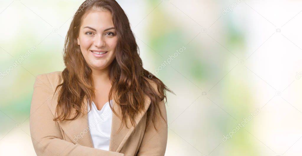 Beautiful plus size young woman wearing winter coat over isolated background happy face smiling with crossed arms looking at the camera. Positive person.