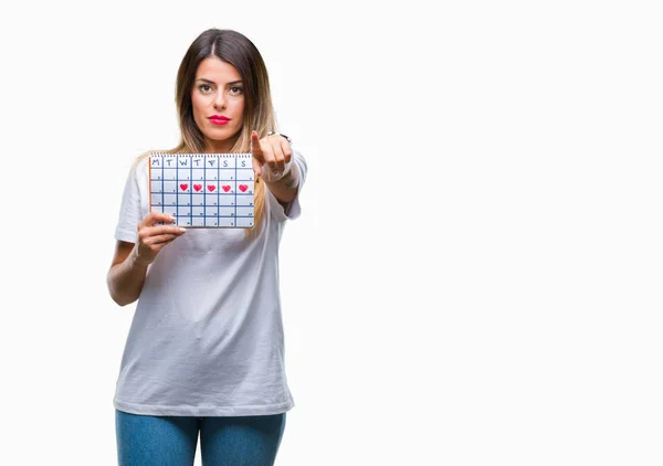 Young Beautiful Woman Holding Menstruation Calendar Isolated Background Pointing Finger — Stock Photo, Image