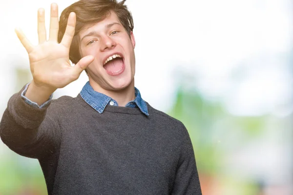 Joven Hombre Elegante Guapo Sobre Fondo Aislado Mostrando Apuntando Hacia — Foto de Stock