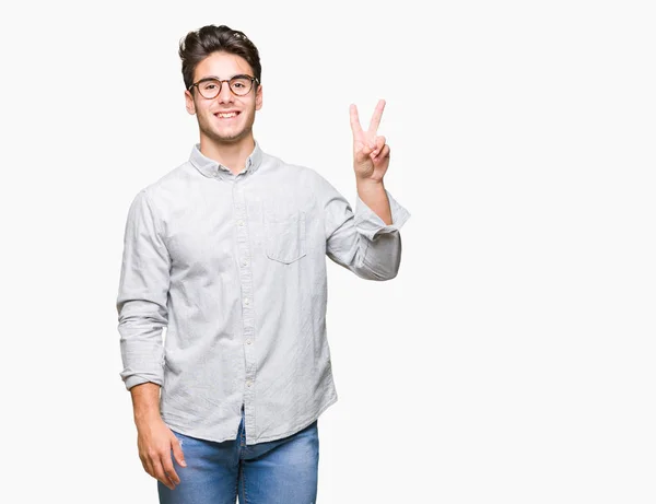 Jovem Homem Bonito Usando Óculos Sobre Fundo Isolado Sorrindo Com — Fotografia de Stock