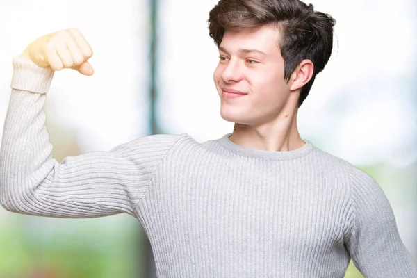 Junger Gutaussehender Mann Trägt Winterpullover Über Isoliertem Hintergrund Starke Person — Stockfoto