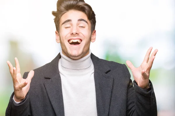 Jovem Homem Elegante Vestindo Casaco Inverno Sobre Fundo Isolado Celebrando — Fotografia de Stock