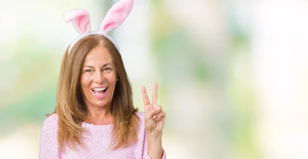 Middelbare Leeftijd Brunette Vrouw Pasen Konijn Oren Dragen Geïsoleerde Achtergrond — Stockfoto