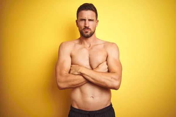 Young Handsome Shirtless Man Isolated Yellow Background Skeptic Nervous Disapproving — Stock Photo, Image