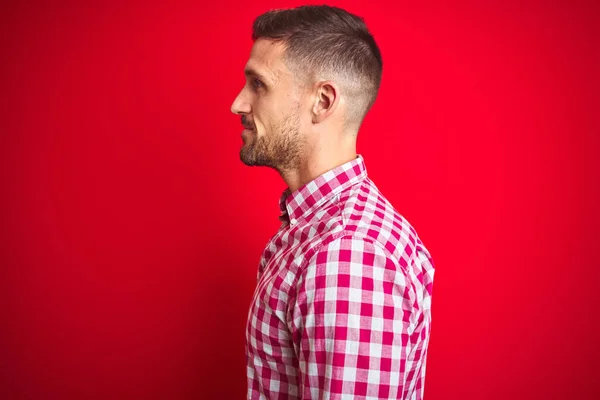 Young Handsome Man Red Isolated Background Looking Side Relax Profile — Stock Photo, Image