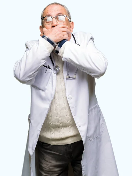 Handsome Senior Doctor Man Wearing Medical Coat Shocked Covering Mouth — Stock Photo, Image