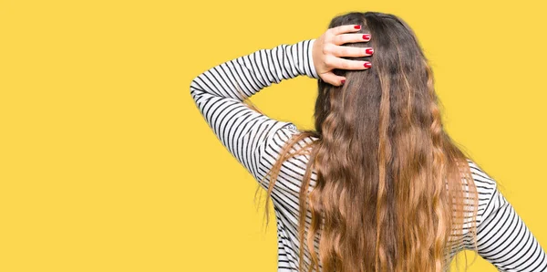 Young Beautiful Woman Wearing Stripes Sweater Backwards Thinking Doubt Hand — Stock Photo, Image