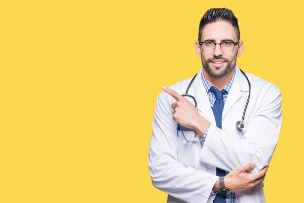 Guapo Joven Médico Sobre Fondo Aislado Señalando Con Dedo Mano — Foto de Stock