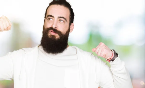 Young Man Long Hair Beard Wearing Sporty Sweatshirt Showing Arms — Stock Photo, Image