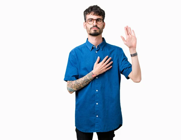 Young Handsome Man Wearing Glasses Isolated Background Swearing Hand Chest — Stock Photo, Image