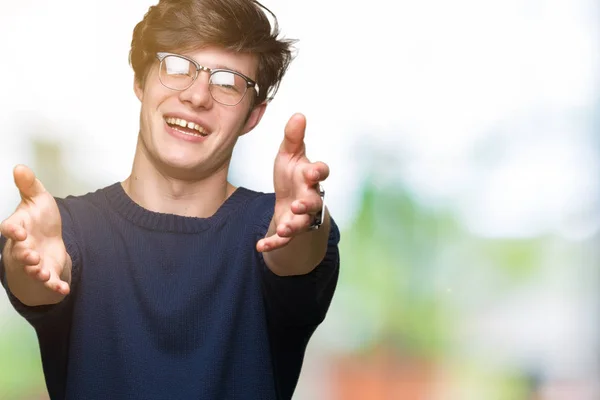 Junger Gutaussehender Mann Mit Brille Vor Isoliertem Hintergrund Der Mit — Stockfoto