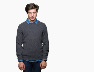 Genç yakışıklı zarif adam izole arka plan şüpheci ve gergin, çatık sorunu nedeniyle üzgün. Negatif kişi.