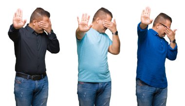 Arap orta yaş kompozisyonu adam elleriyle gözlerini kapsayan izole arka plan üzerinde ve stop jest ile acı ve korku ifadesi. Utandım ve negatif kavramı.