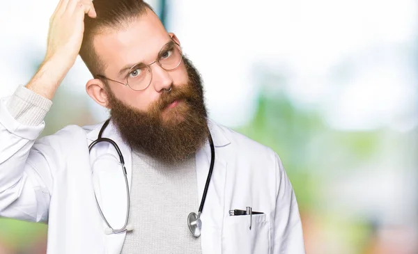 Young Blond Doctor Man Beard Wearing Medical Coat Confuse Wonder — Stock Photo, Image