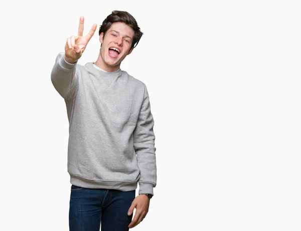 Ung Snygg Sportig Man Klädd Sweatshirt Över Isolerad Bakgrund Visar — Stockfoto