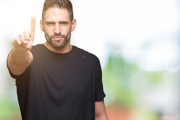 Jovem Homem Bonito Sobre Fundo Isolado Apontando Com Dedo Para — Fotografia de Stock