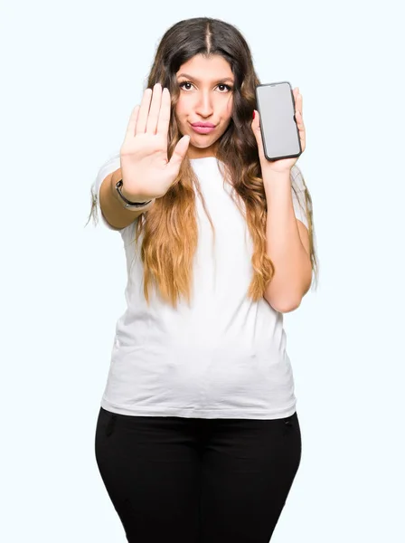 Young Adult Woman Showing Smartphone Screen Open Hand Doing Stop — Stock Photo, Image