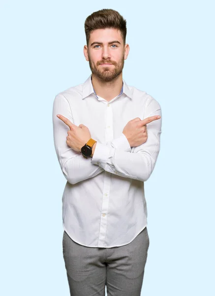 Young Handsome Business Man Pointing Both Sides Fingers Different Direction — Stock Photo, Image