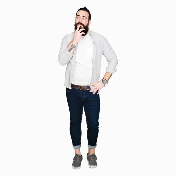 Young Man Long Hair Beard Earrings Hand Chin Thinking Question — Stock Photo, Image