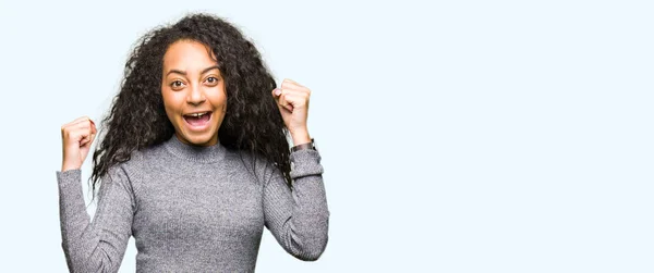 Young Beautiful Girl Curly Hair Celebrating Surprised Amazed Success Arms — Stock Photo, Image