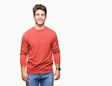 Yakışıklı delikanlı yüzünde mutlu ve güzel bir gülümseme ile izole arka plan üzerinde. Şanslı kişi.